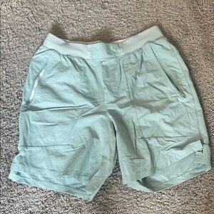 Lululemon Teal linerless 7”